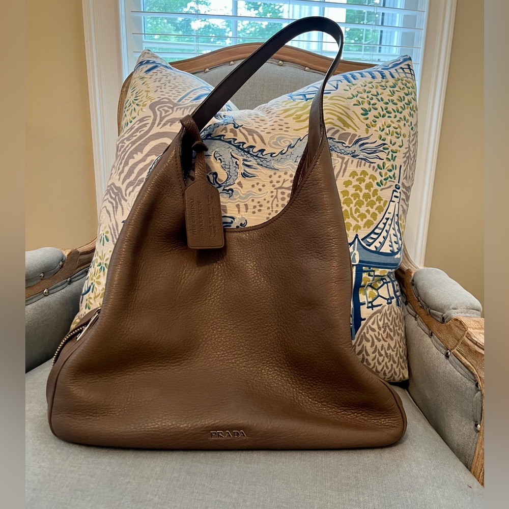 Authentic gray Prada deerskin shoulder bag with zipper details.